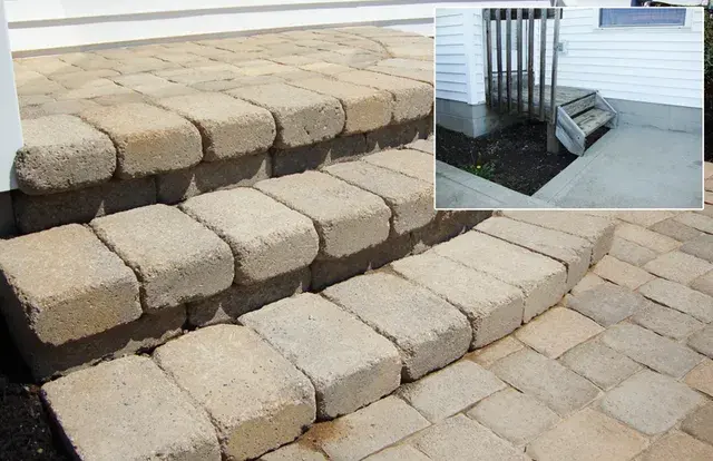 New paver stone steps and walkway replacing an old metal stoop, shown before and after